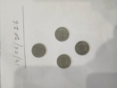 Set of 4 Vintage Coins with Fist Design