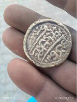 Antique Coin with Intricate Design