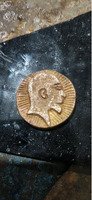 Vintage Coin with Profile and Floral Design