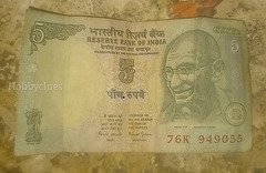 Old Indian 5 Rupees Banknote with Mahatma Gandhi