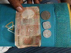 Vintage Indian 2 Rupees Banknote with 5, 10, and 25 Paise Coins