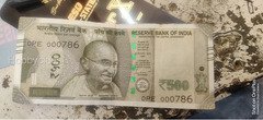 Old Indian 500 Rupees Banknote with Serial Number OPE 000786