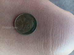 not sure it's an old George Washington dollar coin