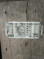 selling of Indian Rs 500 currency note with holy number 786
