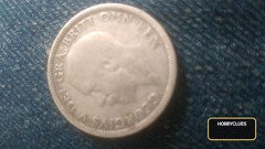 Vintage British Coin Featuring King George VI and a Lion
