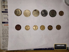 Collection of Vintage Indian Coins Featuring Mahatma Gandhi and British Monarchs