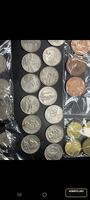 Mixed Collection of International Coins Including US Quarters and UK Pennies
