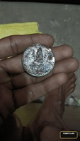 Old Worn Silver Coin with Religious Figure