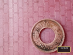 1945 Queen Victoria rule crown picture rare copper coin with a hole in center