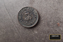 Vintage Indian Coin with Devanagari Script