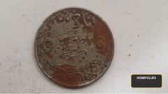 Vintage Coin with Arabic Script and Symbols