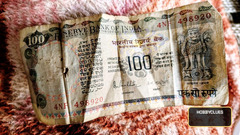 Indian 100 Rupees Banknote with Tractor and Ashoka Emblem