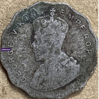 Old Collectible Coin with Central Emblem and Decorative Script - Image 2