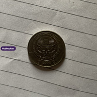 2000 25 Cent Coin with Radiant Emblem Design