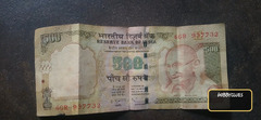 Indian 100 Rupees Banknote with Mahatma Gandhi Portrait