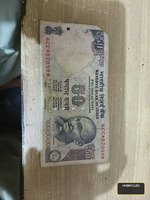 Indian 50 Rupees Banknote with Mahatma Gandhi and Parliament Design