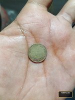 Thailand 1 Baht Coin Featuring King Bhumibol and Temple