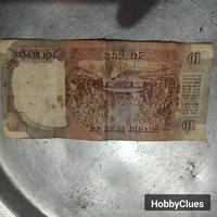 Vintage Indian 10 Rupees Banknote with Historical Design
