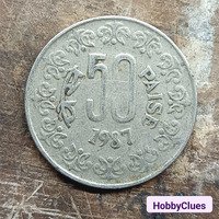 This is an Indian coin of 50 paisa which was minted in 1987.